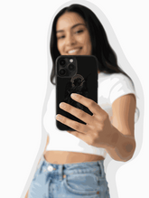 Minimalist Ángel Oscuro phone case with dark elegant design and subtle light details